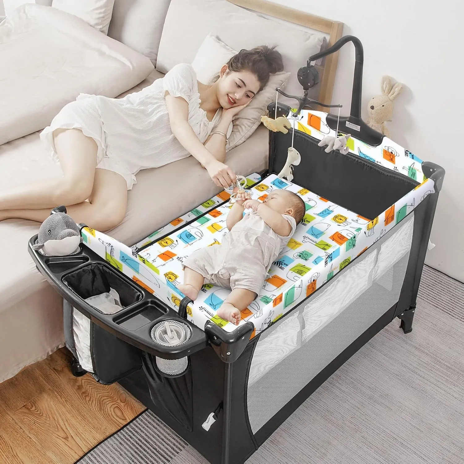 5-in-1 Pack and Play, Baby Bassinet Bedside Sleeper with U-Shaped Diaper Changer, Portable Toddler Playard for Newborn Toddlers, Baby Crib with 4 Adjustable Height,Carry Bag, Easy to Install (Cartoon)